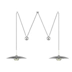 Pendant light with polished globe shade in a room setting