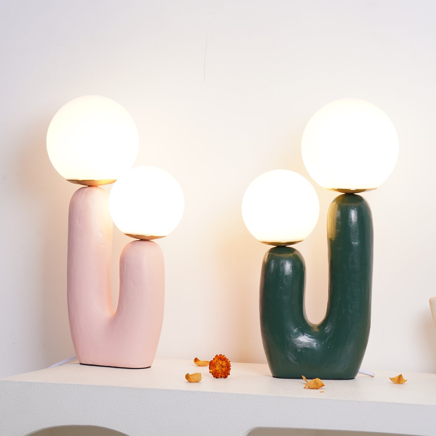 Table lamp with characterful body and warm glass glow