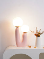 Table lamp with rounded body and soft diffused light