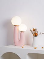 Table lamp styled on a desk with warm glow