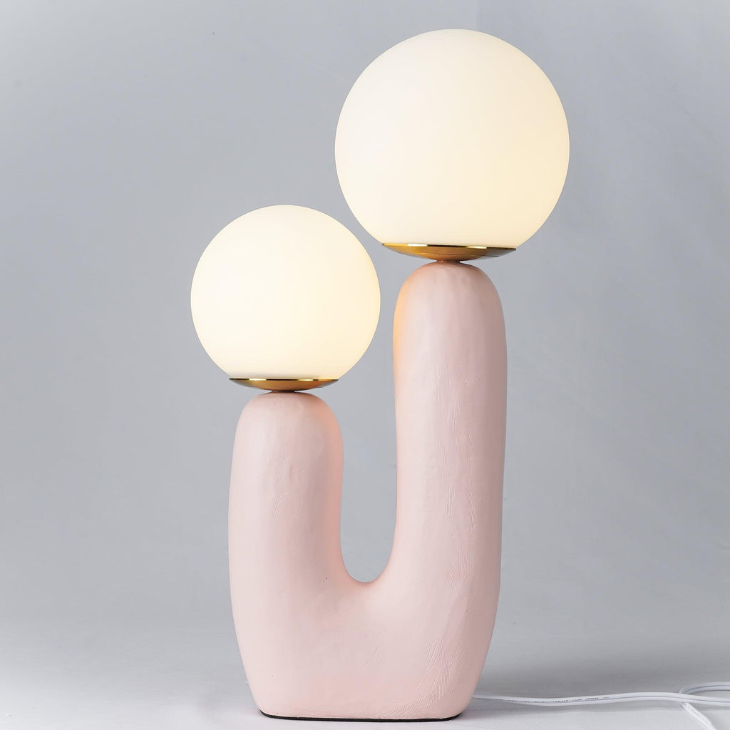 Table lamp with characterful body and soft warm glow