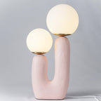 Table lamp with characterful body and soft warm glow