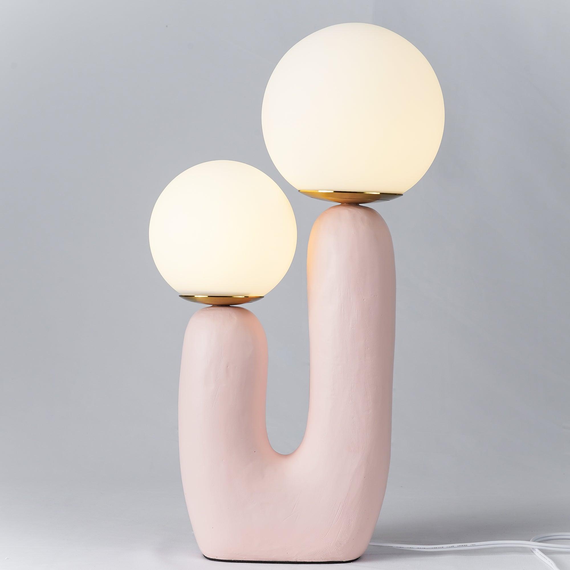 Table lamp with characterful body and soft warm glow