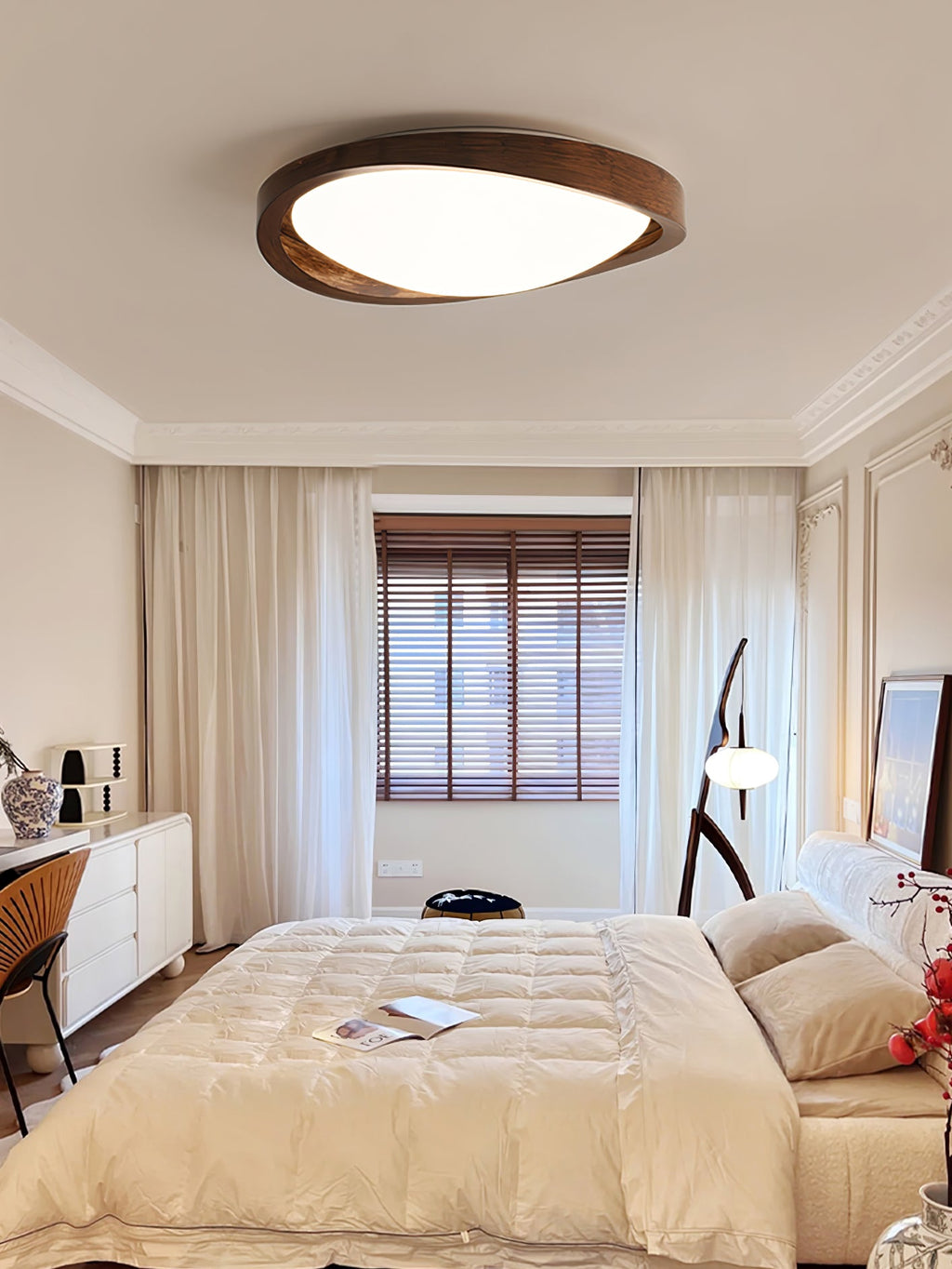 Wooden curved edge ceiling light mounted in a bright room