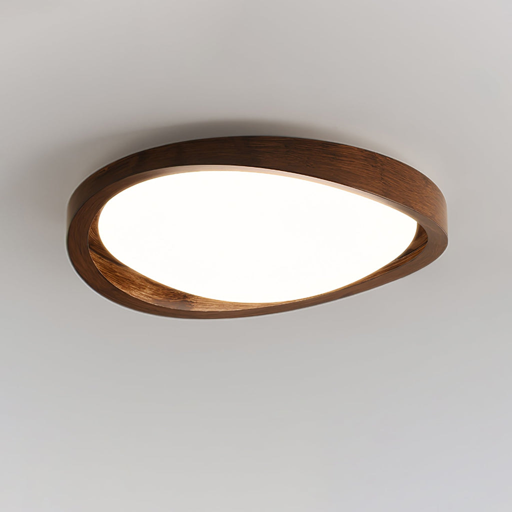 Wooden curved edge ceiling light glowing in a warm interior