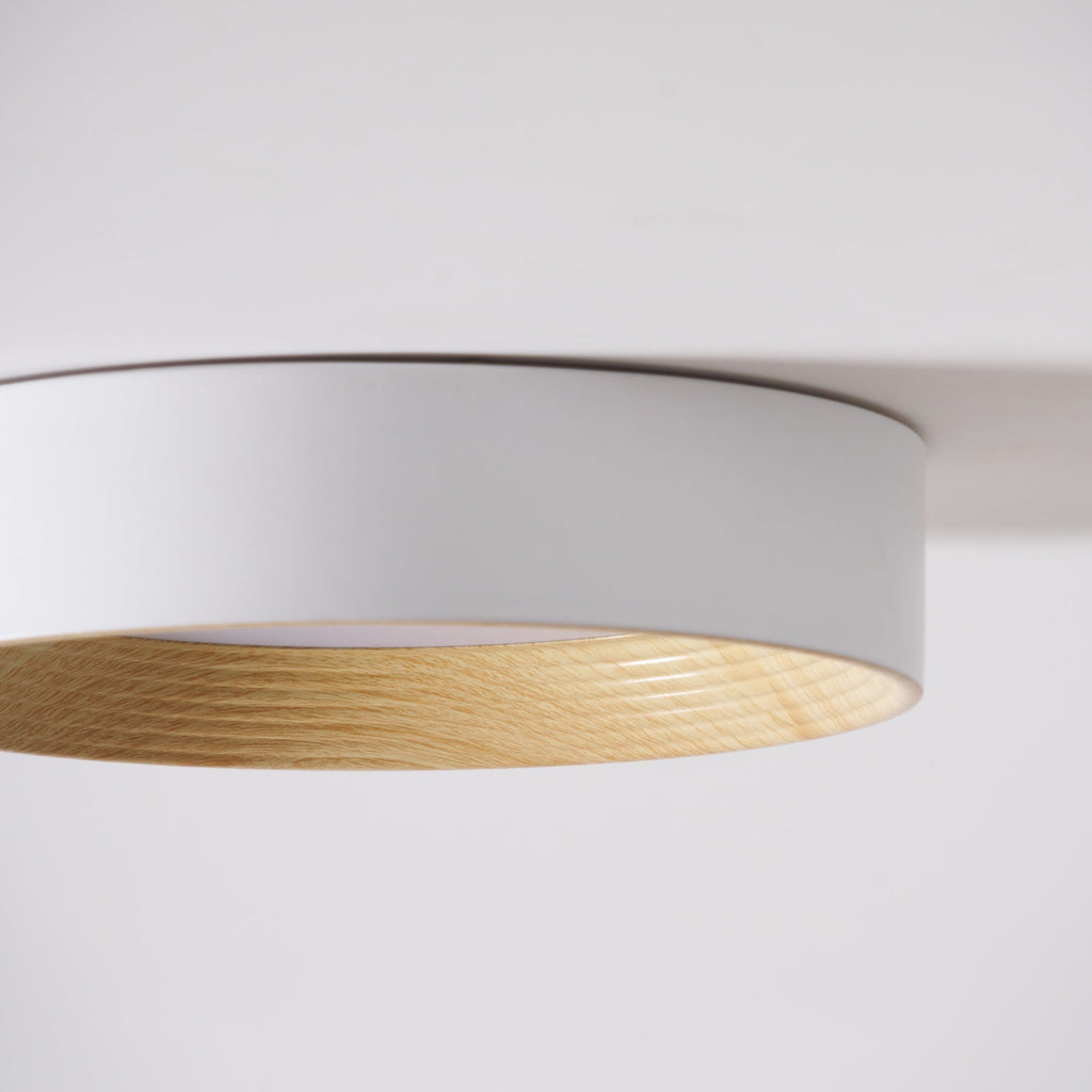 Round flush mount ceiling light shown fully lit
