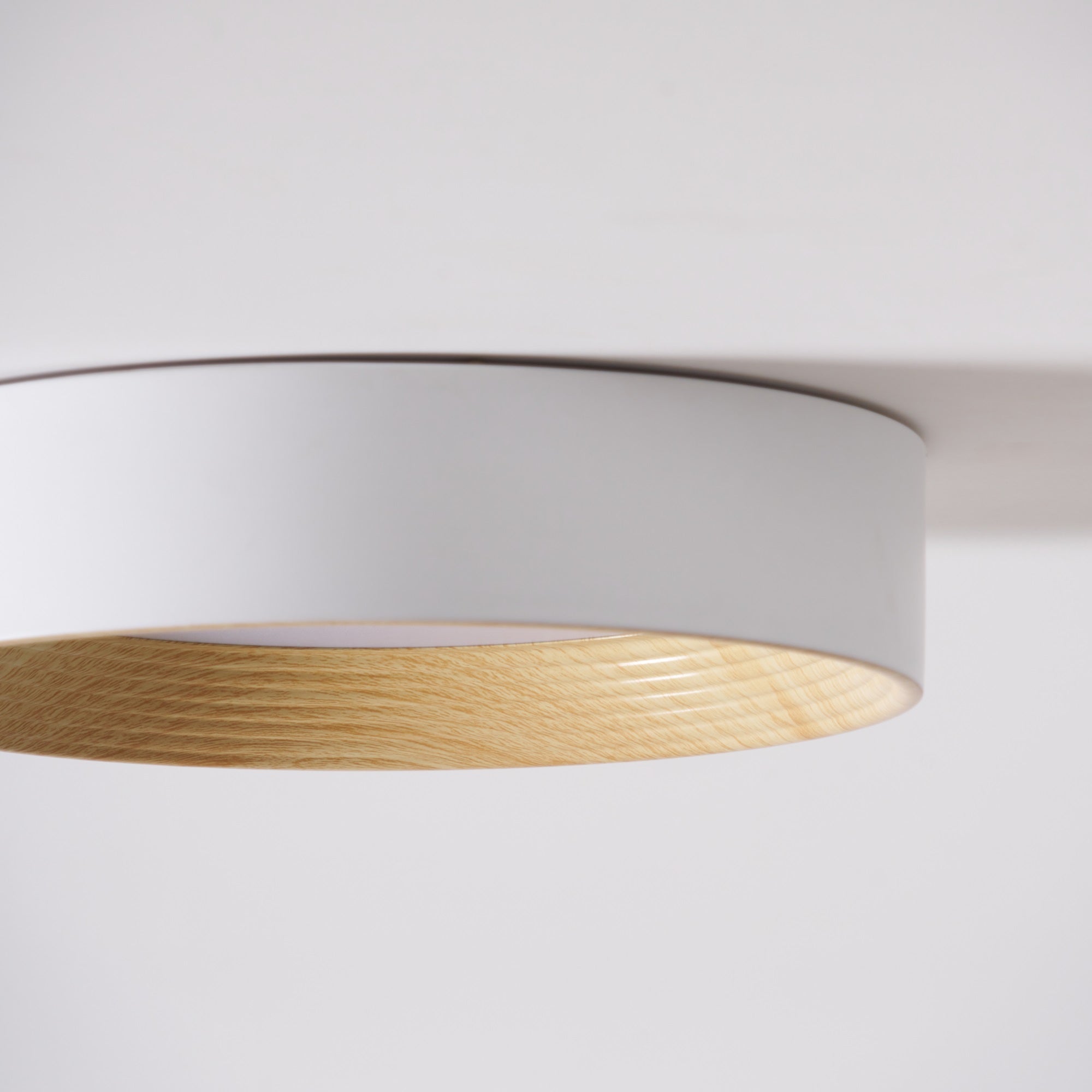 Round flush mount ceiling light shown fully lit