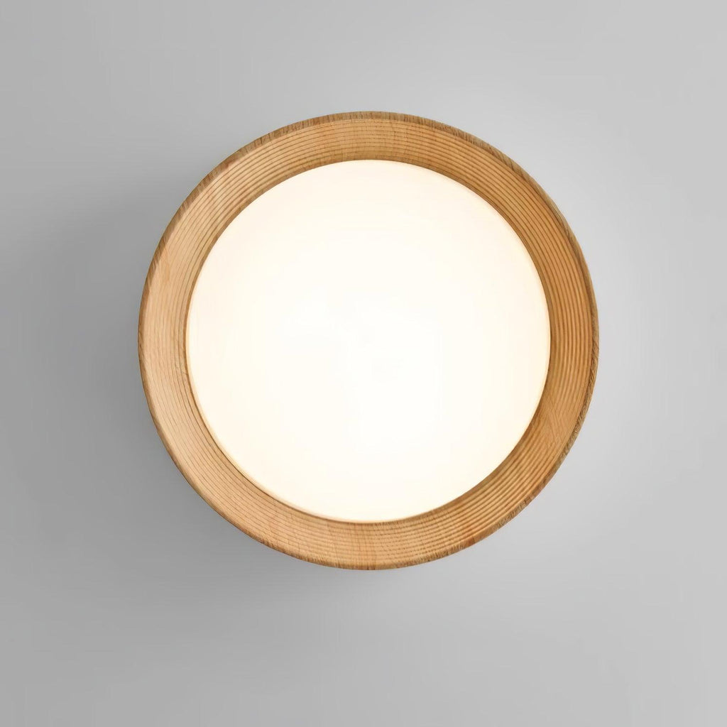 Wood-tone ceiling light in a contemporary living space