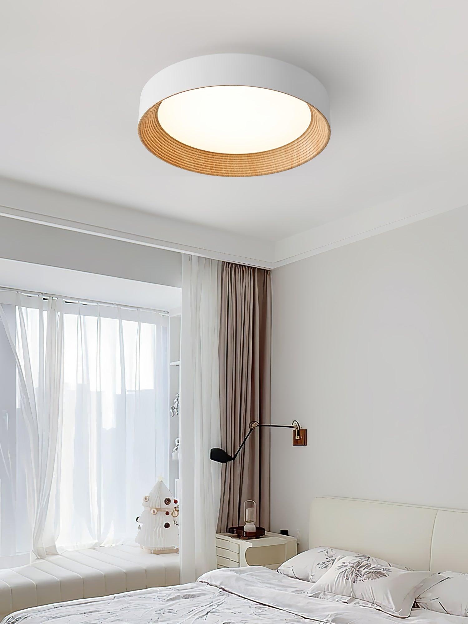 Round ceiling light in a minimalist room setting