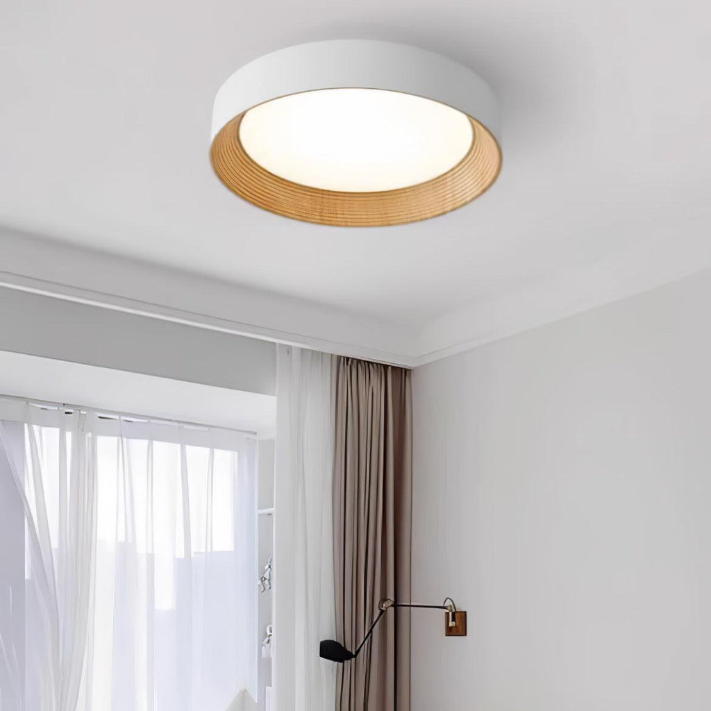 Ceiling light spreading soft even light in a bedroom