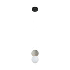 A grey stone-textured sphere tops this Clérachic pendant, its opal glass globe set below on a black cord against white.