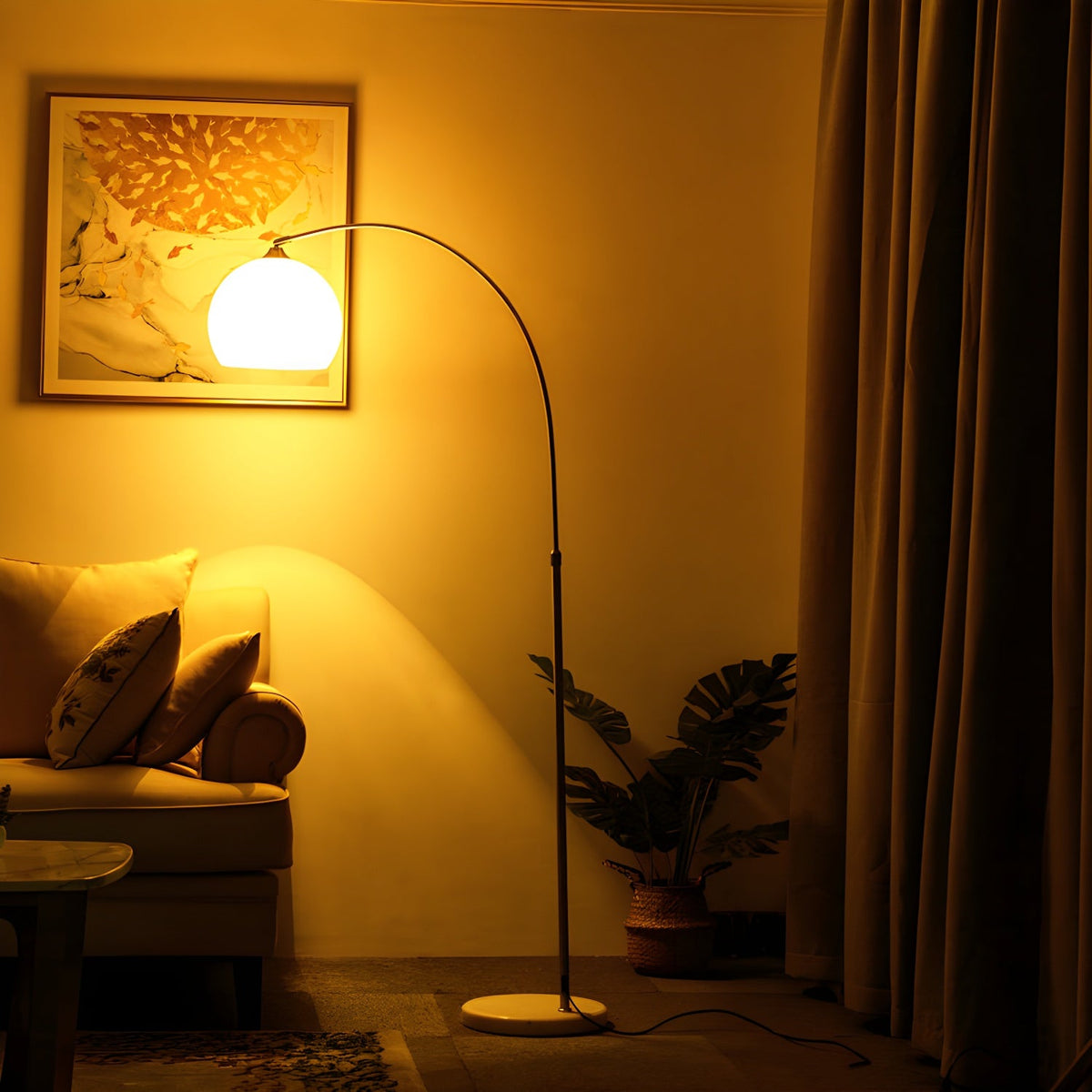 A Clérachic arc floor lamp with a white dome shade glows warmly over an armchair in a dimly lit living room.