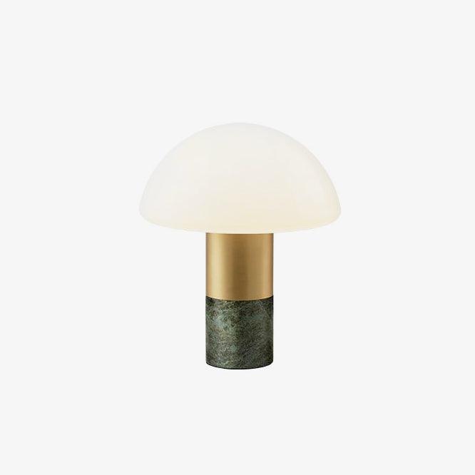 A smaller-framed studio shot shows the same Clérachic domed table lamp, its green marble base glowing on a light backdrop.