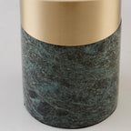 Macro close-up of the green marble texture on a Clérachic table lamp's base where it meets the brushed gold stem.