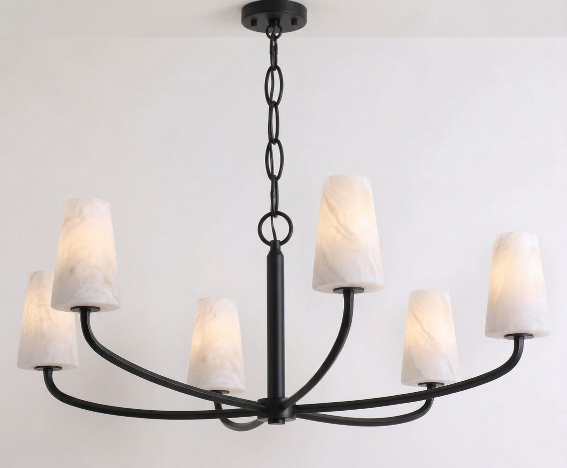 Shown wide against a plain backdrop, the six woven arms of this Clérachic chandelier spread out in matte black.