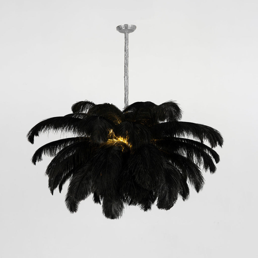 Ostrich feather chandelier shown from below with radiating plumes