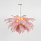 Ostrich feather chandelier styled in a refined dining space