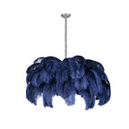 Ostrich feather chandelier with layered plumes catching the light