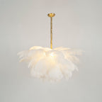 Ostrich feather chandelier with soft cascading plumes and brass base