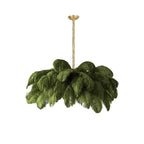 Ostrich feather chandelier glowing warmly in a styled interior
