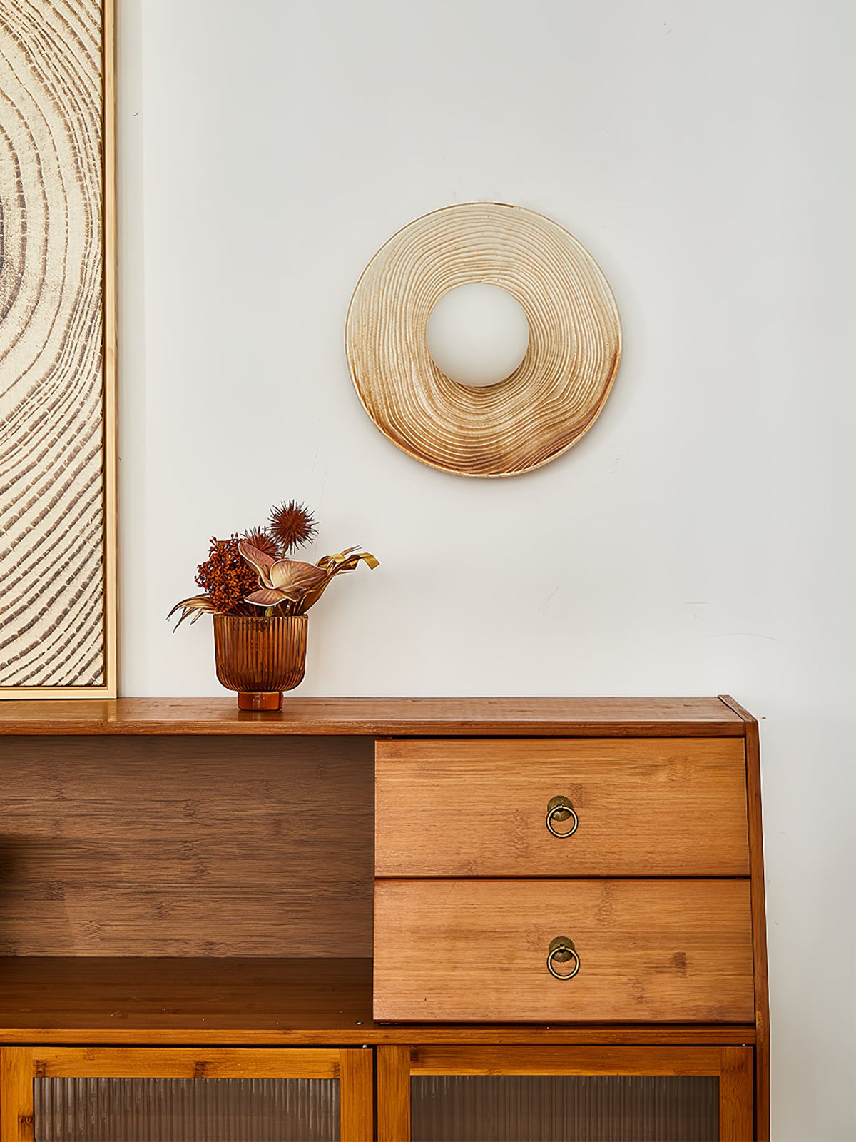 A ridged terra-beige ceramic ring from a Clérachic wall sconce, shown here with its centre open and no glass globe fitted.