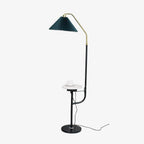 Clérachic fabric floor lamp shown full length on a plain white background, its pleated green shade, brass arm and marble side tray all visible.