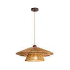 Layered paper-twine tiers and a walnut cap define this Clérachic pendant, shown glowing against a plain background.