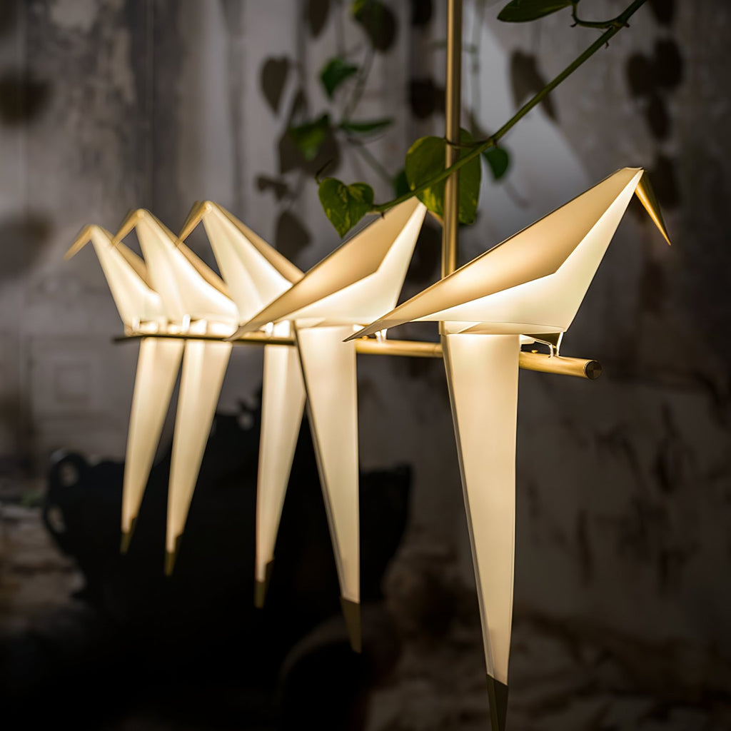 Bird chandelier showing acrylic birds suspended in a room