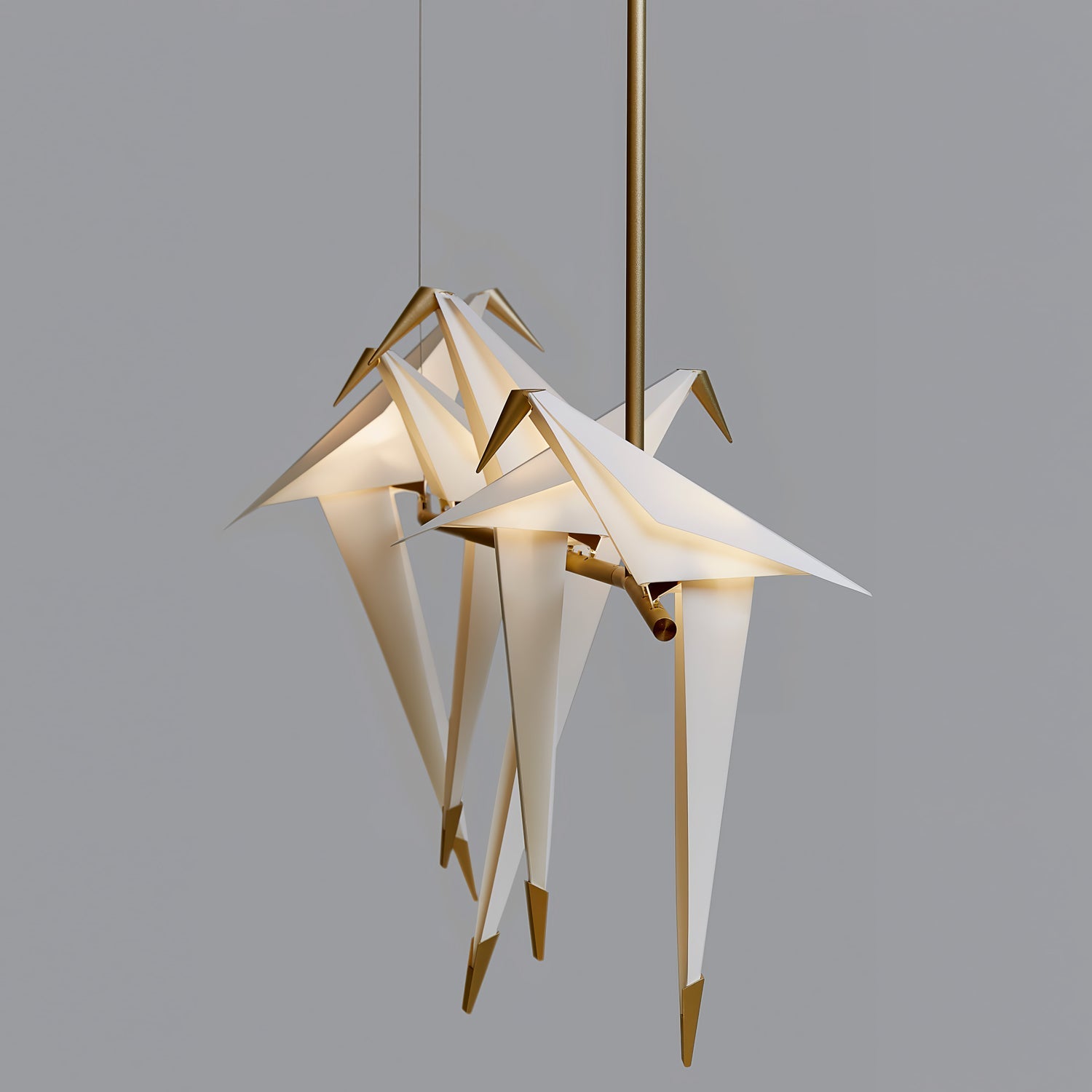 Bird chandelier with gold frame and birds over a table