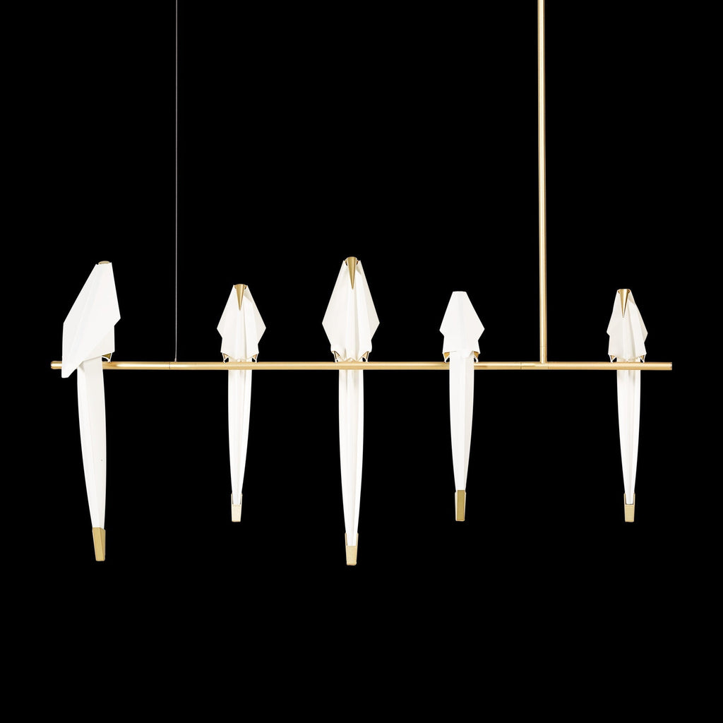 Bird chandelier close view of acrylic bird and gold branch