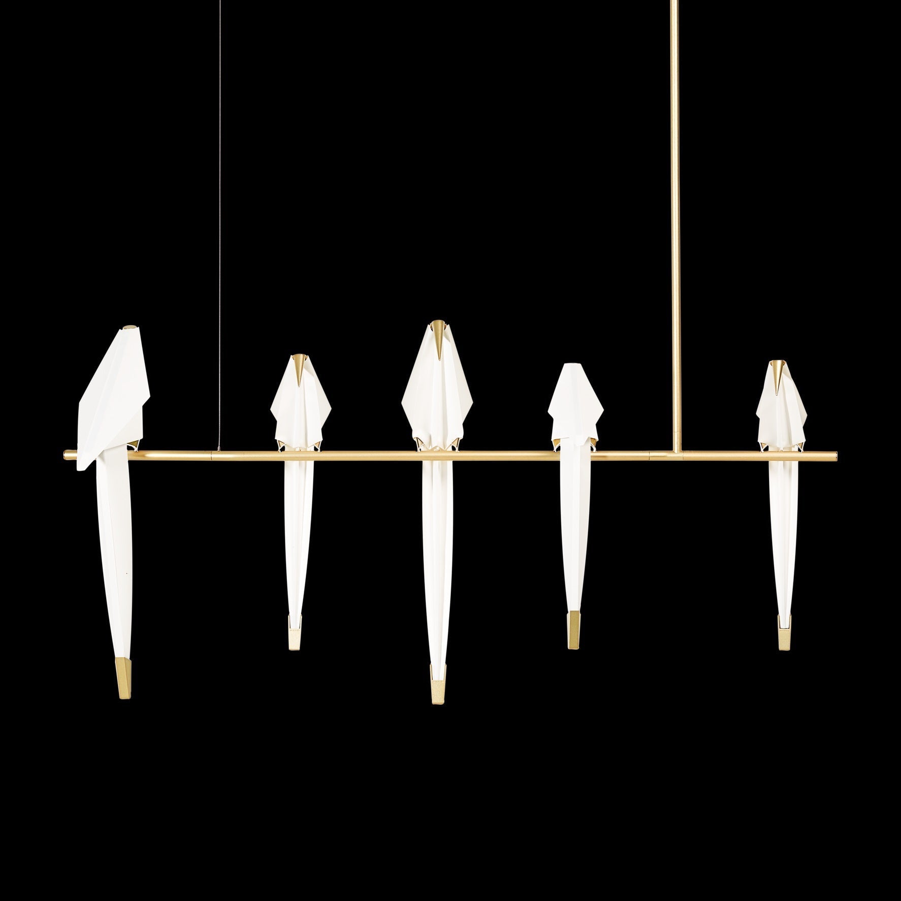Bird chandelier close view of acrylic bird and gold branch