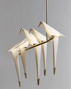 Bird chandelier with multiple birds along a gold rod frame