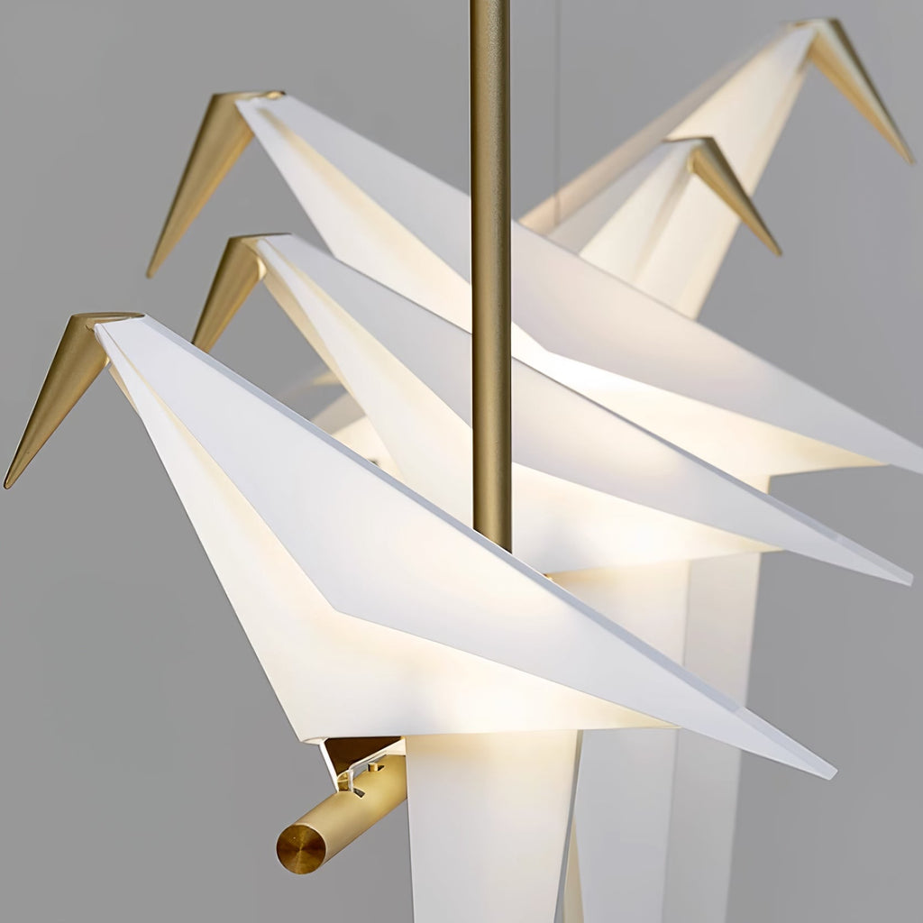 Bird chandelier styled in a warm, minimal living room