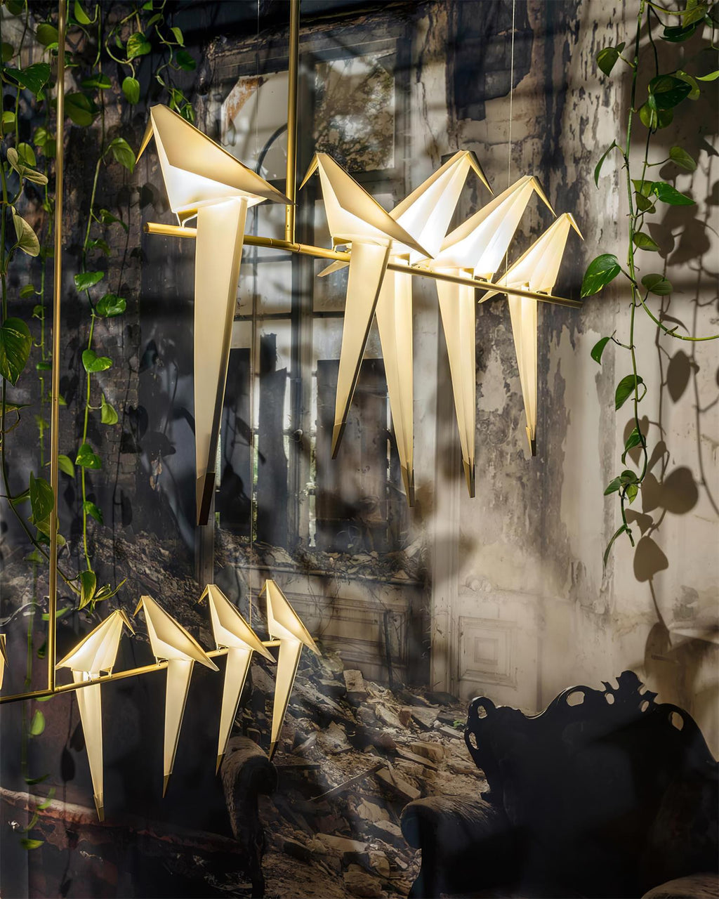 Bird chandelier with warm light and perched acrylic birds