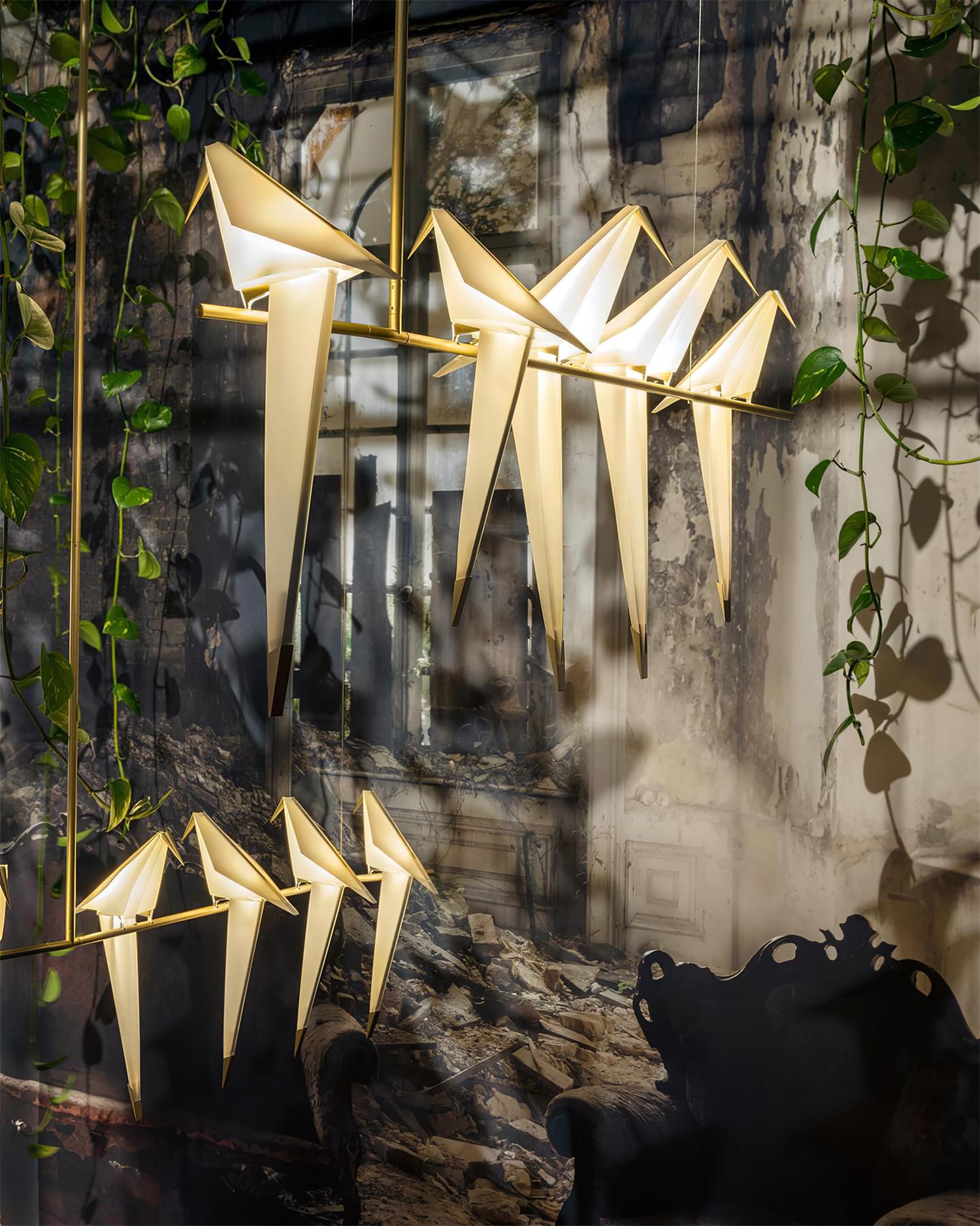 Bird chandelier with warm light and perched acrylic birds