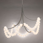 Parel alabaster chandelier in the nickel finish, strands of lit stone beads on brushed grey arms