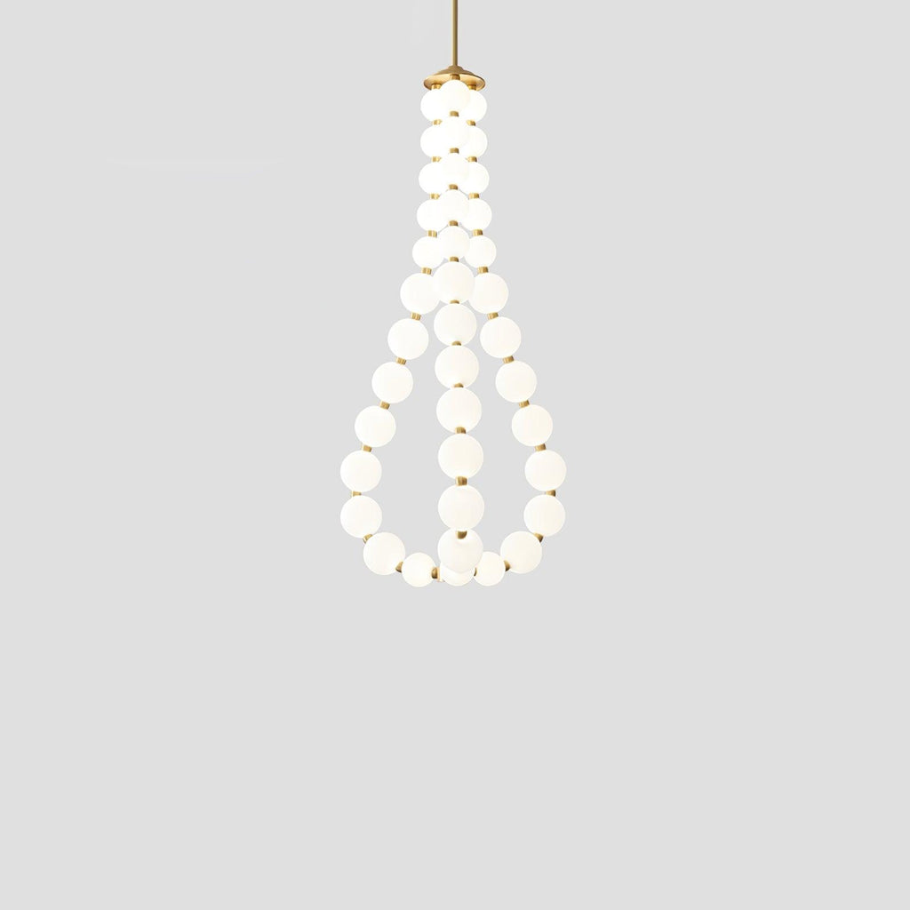 Acrylic pearl chandelier suspended above a modern interior