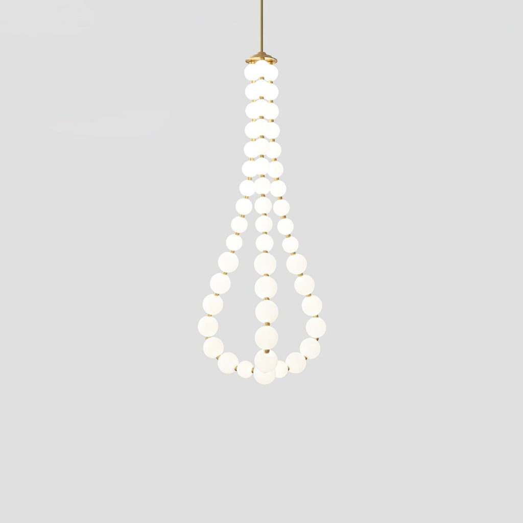 Acrylic pearl chandelier with white orbs and warm glow