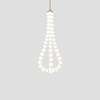 Acrylic pearl chandelier with white orbs and warm glow