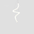 Acrylic pearl chandelier detail of clustered glowing white orbs
