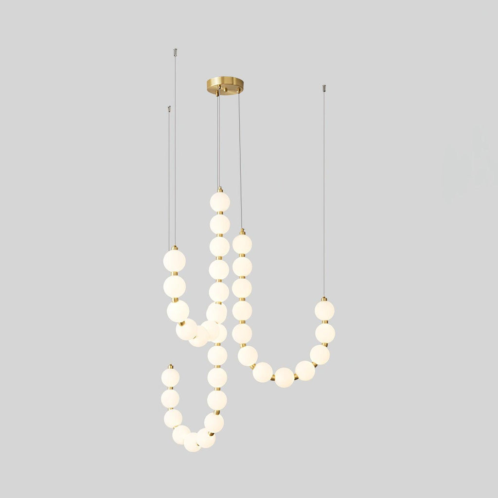 Acrylic pearl chandelier with brass frame and luminous orbs