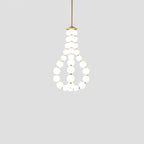 Acrylic pearl chandelier styled as a glowing centrepiece
