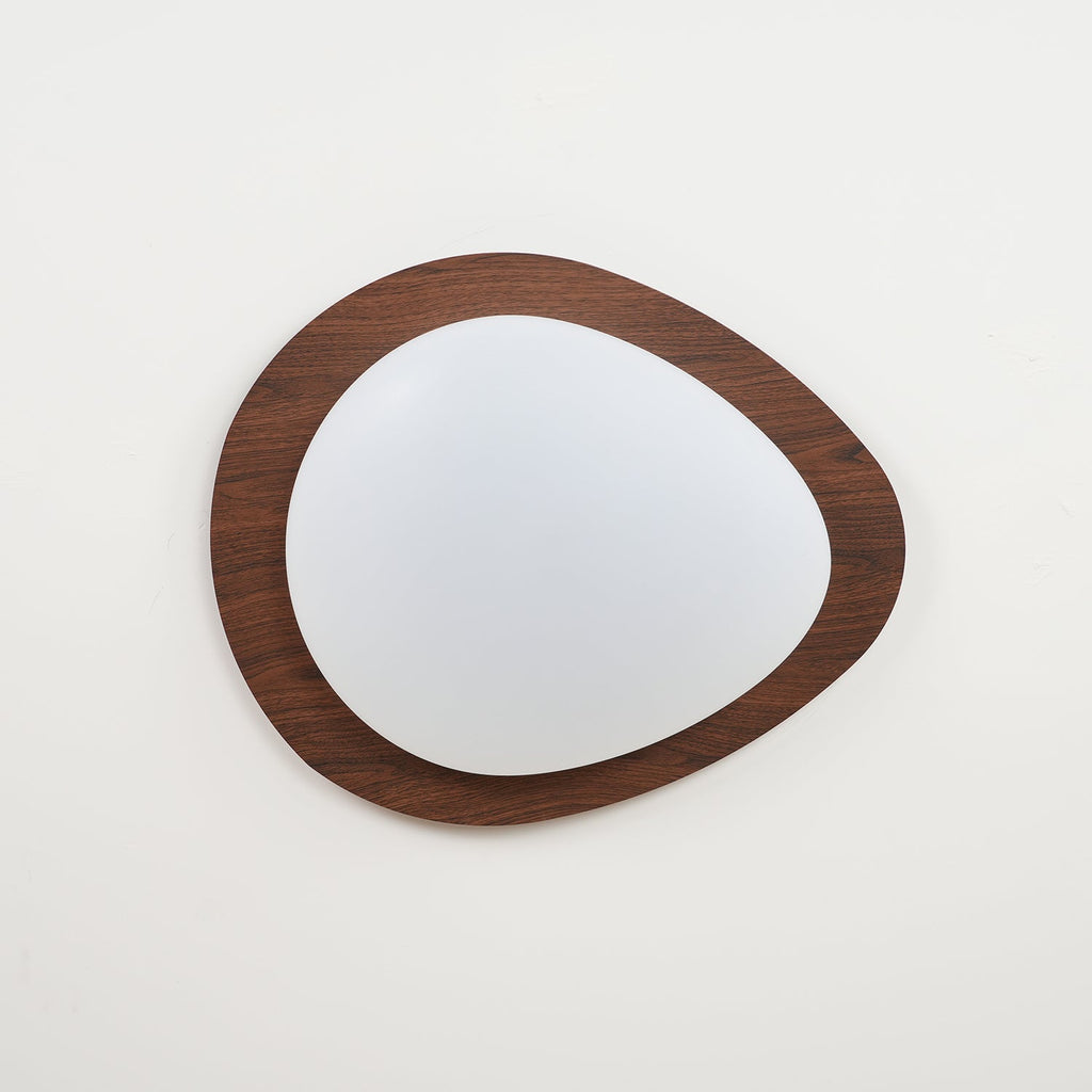 Walnut grain pebble ceiling light glowing softly overhead