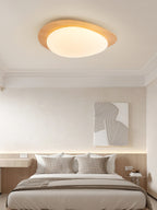 Walnut grain pebble ceiling light lit warmly