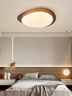 Rounded pebble ceiling light in a cosy setting