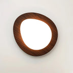Pebble ceiling light glowing gently in an interior