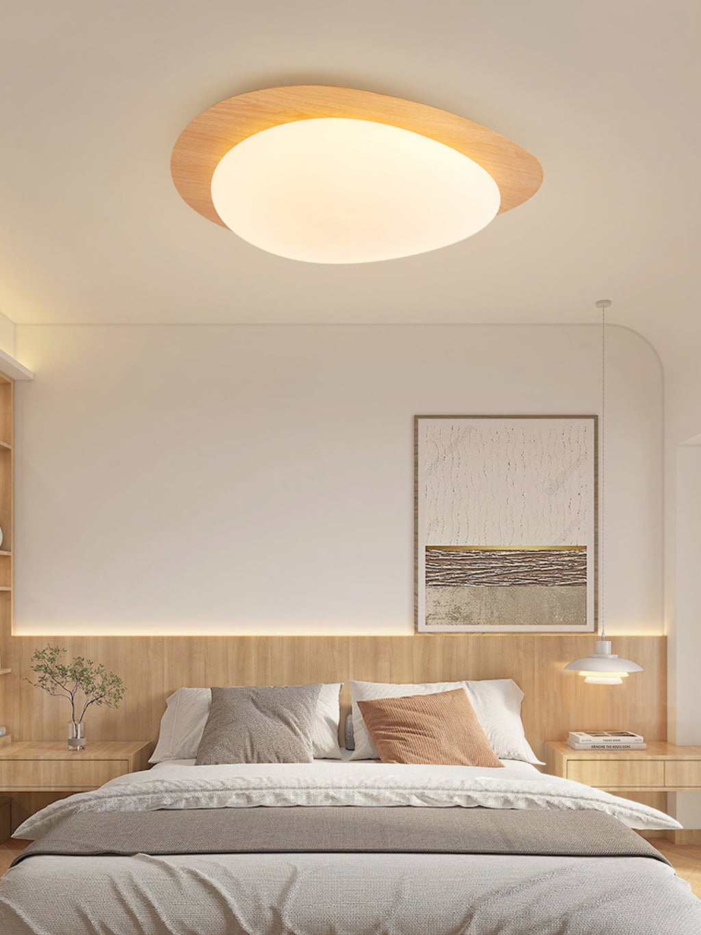 Pebble ceiling light with smooth rounded profile