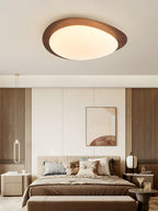 Pebble ceiling light glowing warm in a living space
