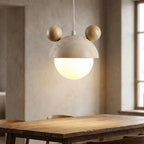 Pendellampe med travertinfinish, legende silhuetdesign