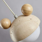 Pendellampe med travertinfinish, legende silhuetdesign